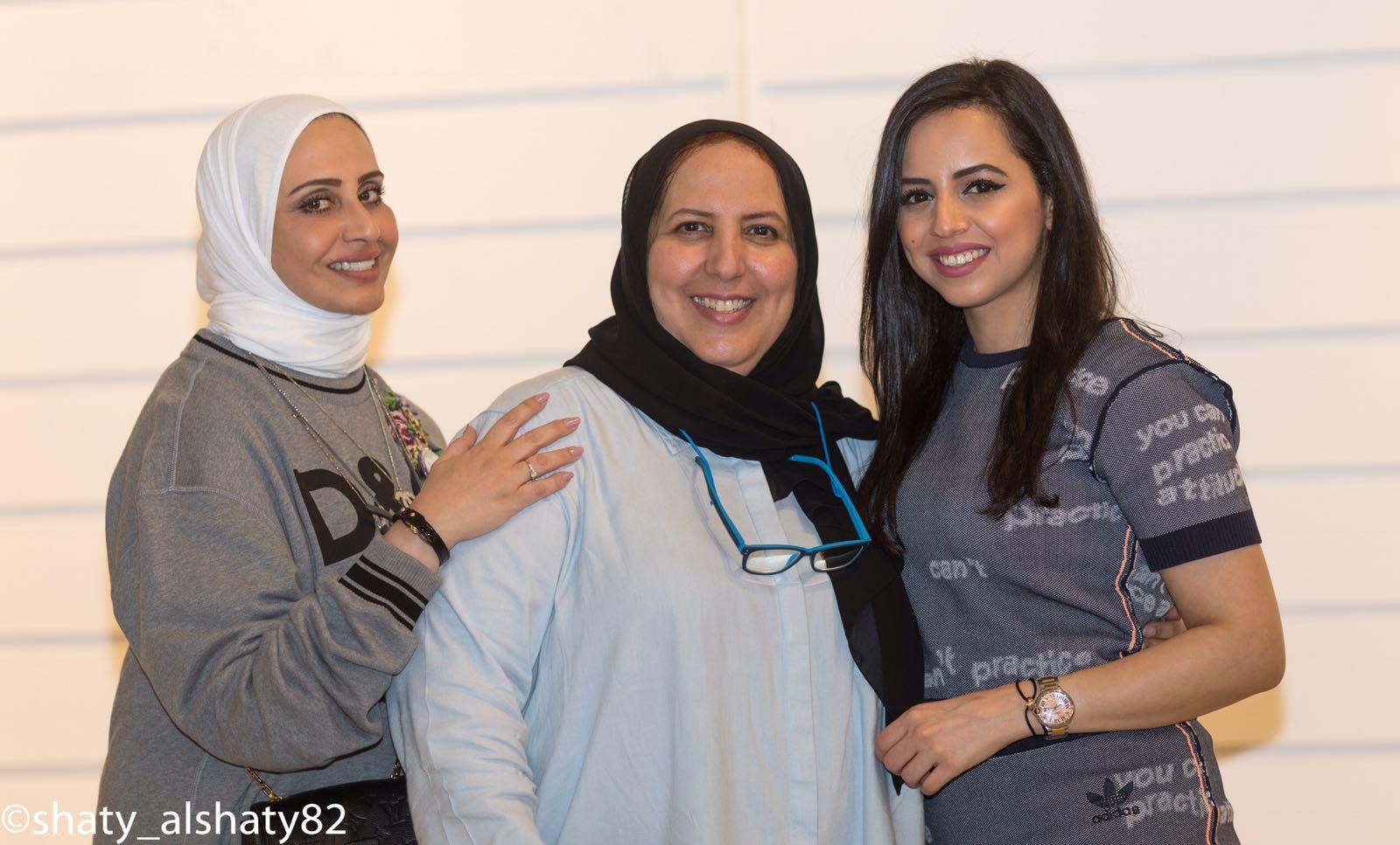 Members gather together for a TGI club group portrait.