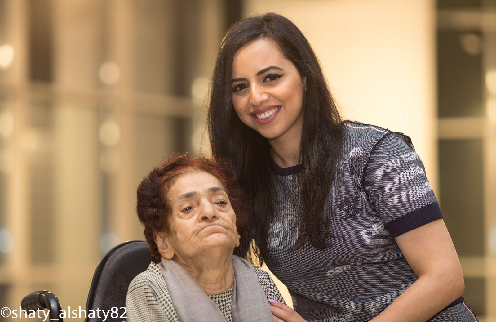 Members smile for a group picture at a TGI Members Club gathering.