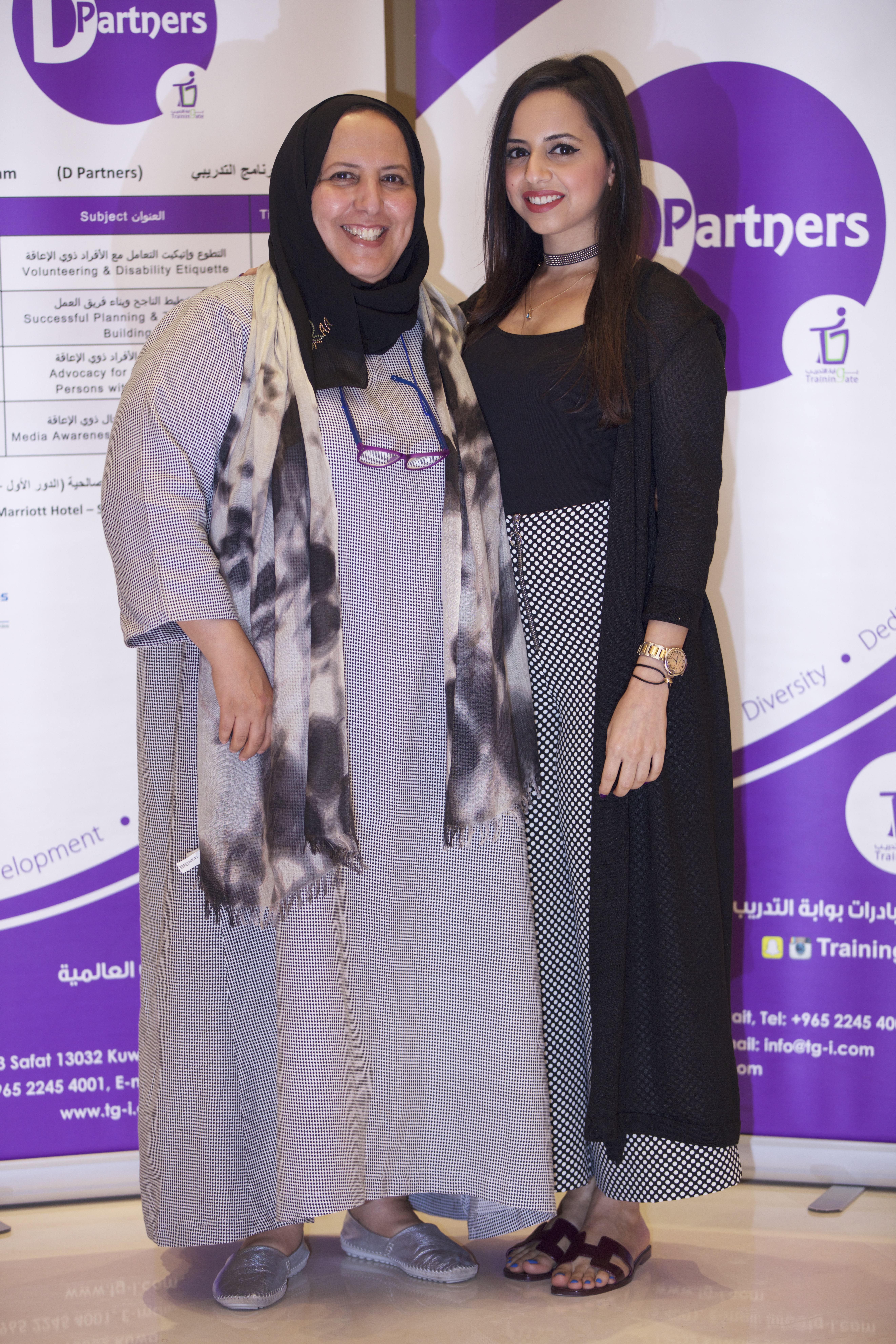 ماما كفاية ونورة خلال فعالية مجتمعية ضمن مبادرات TGI.